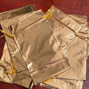 Pack of 10 gold lame party bags with draw string